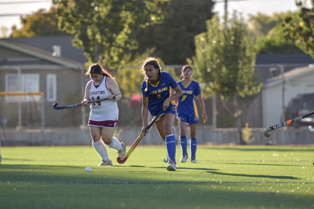 Freshman Allysa Domensino (not mentioned in story) steals the ball and charges down the field against Cupertino's field hockey team on October 14. 